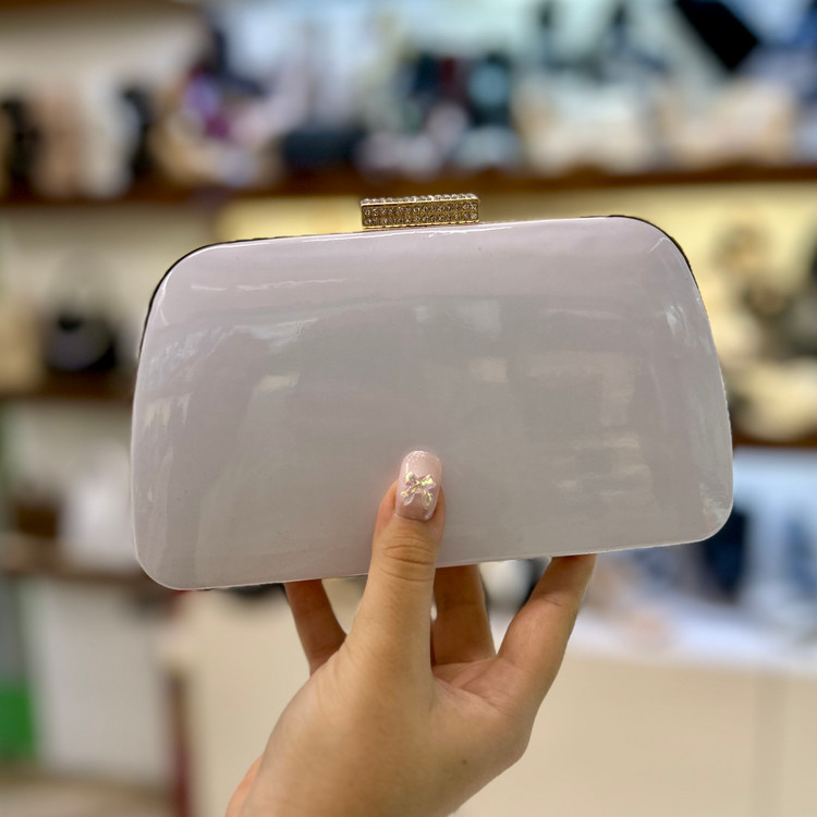 عکس کیف شب دهنه دار ورنی سفید